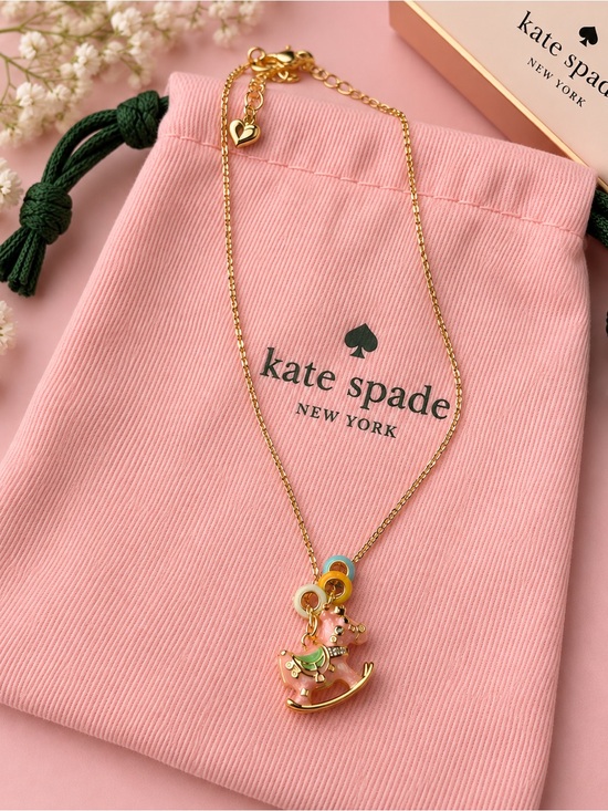 kate spade Jewelry - kate spade Gold Necklace with Pink and Green Rocking Horse Charms